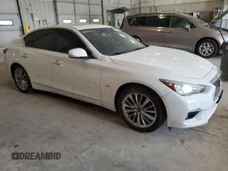 2020 Infiniti Q50 Luxe with VIN JN1EV7AR4LM257143, listed as a Copart auction lot 57157065 with 98,082 mi miles and Salvage title. Bid and sale history available at DreamBid. Image 4.