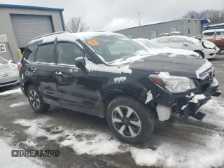 2017 Subaru Forester with VIN JF2SJABC4HH477211, listed as a Copart auction lot 87747625 with Not provided miles and Salvage title. Bid and sale history available at DreamBid. Image 4.