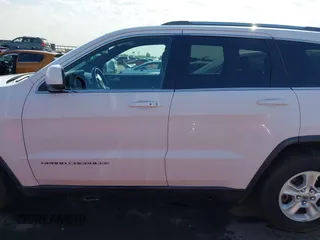 2014 Jeep Grand Cherokee Laredo with VIN 1C4RJEAG3EC125478, listed as a IAAI auction lot 41938499 with 167,588 mi miles and . Bid and sale history available at DreamBid. Image 14.