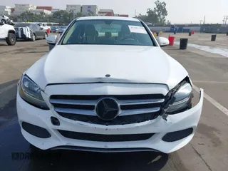 2017 Mercedes-Benz C 300 with VIN 55SWF4JB6HU210940, listed as a IAAI auction lot 41482598 with 101,135 mi miles and . Bid and sale history available at DreamBid. Image 6.