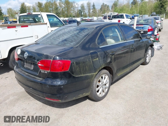2013 Volkswagen Jetta Sedan SE w/Convenience/Sunroof with VIN 3VWDX7AJ0DM377828, listed as a IAAI auction lot 42081874 with 148,080 mi miles. Bid and sale history available at carsss.com. Image 4.