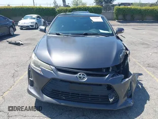 2015 Scion tC with VIN JTKJF5C74F3090309, listed as a IAAI auction lot 41988036 with 158,240 mi miles. Bid and sale history available at carsss.com. Image 12.