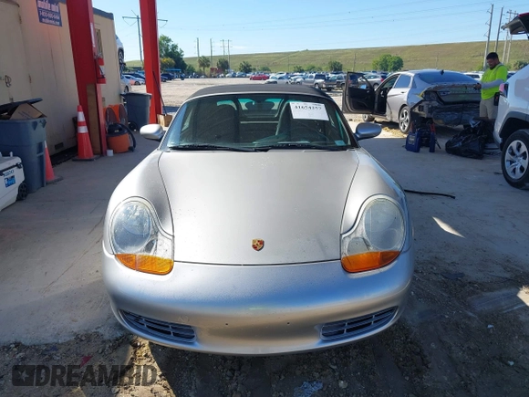 2002 Porsche Boxster z VIN WP0CA29882U622162, wystawiony jako IAAI lot #41654257 z przebiegiem 44 608 mil mil oraz . Historia ofert i sprzedaży dostępna na DreamBid. Obrazek 12.