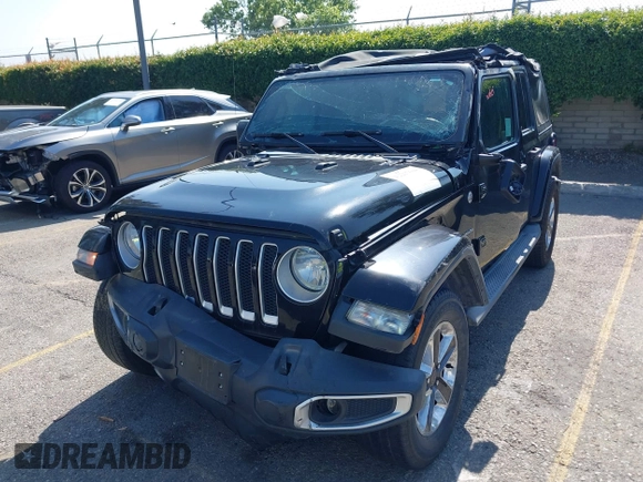 2018 Jeep Wrangler Unlimited Sahara with VIN 1C4HJXEN7JW328981, listed as a IAAI auction lot 42217508 with 59,584 mi miles and . Bid and sale history available at DreamBid. Image 6.