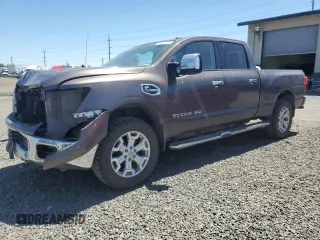 2016 Nissan Titan Platinum Reserve with VIN 1N6BA1F45GN514393, listed as a Copart auction lot 58534775 with 80,810 mi miles and Salvage title. Bid and sale history available at DreamBid. Image 1.