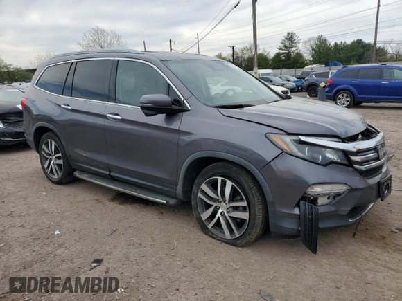 2017 Honda Pilot Touring with VIN 5FNYF5H97HB039702, listed as a Copart auction lot 54046145 with 149,050 mi miles and Salvage Title. Bid and sale history available at carsss.com. Image 4.