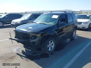 2007 Ford Escape XLS with VIN 1FMYU02Z57KA51068, listed as a IAAI auction lot 39417911 with 1 mi miles. Bid and sale history available at carsss.com. Image 2.