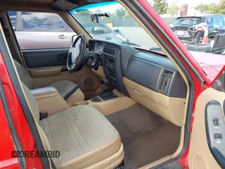 1999 Jeep Cherokee Sport with VIN 1J4FF68S8XL533881, listed as a IAAI auction lot 41947085 with 200,970 mi miles and . Bid and sale history available at DreamBid. Image 5.