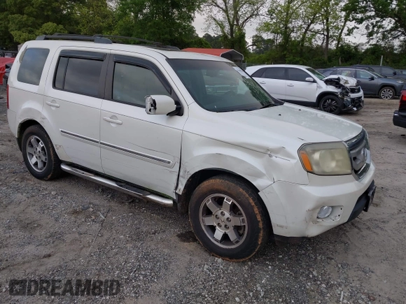 2011 Honda Pilot Touring z VIN 5FNYF4H9XBB053966, wystawiony jako IAAI lot #42148528 z przebiegiem 191 939 mil mil oraz . Historia ofert i sprzedaży dostępna na DreamBid. Obrazek 1.