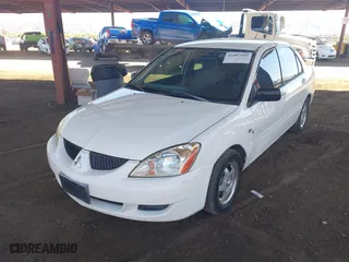 2004 Mitsubishi Lancer ES with VIN JA3AJ26E14U065498, listed as a IAAI auction lot 41887945 with 142,632 mi miles. Bid and sale history available at carsss.com. Image 17.