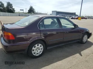 2000 Honda Civic LX with VIN 1HGEJ6678YL058105, listed as a Copart auction lot 54119675 with 272,441 mi miles and Salvage Title. Bid and sale history available at carsss.com. Image 3.