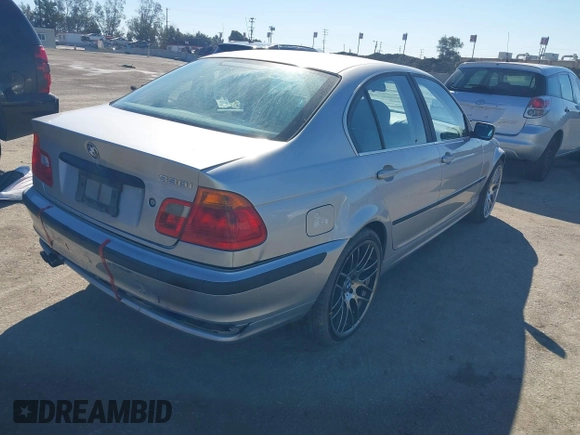 2001 BMW 3 Series 330i with VIN WBAAV53451FJ66575, listed as a IAAI auction lot 41665948 with 197,048 mi miles. Bid and sale history available at carsss.com. Image 4.