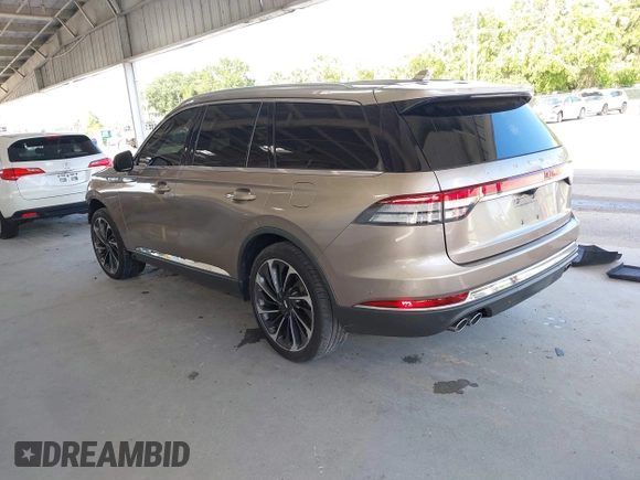 2020 Lincoln Aviator Reserve with VIN 5LM5J7XC0LGL10343, listed as a IAAI auction lot 42486201 with 62,418 mi miles and . Bid and sale history available at DreamBid. Image 3.