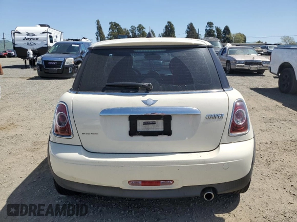 2012 MINI Hardtop with VIN WMWSU3C56CT255161, listed as a Copart auction lot 52227795 with 101,535 mi miles and Clean Title. Bid and sale history available at DreamBid. Image 6.