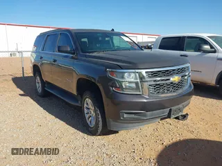 2015 Chevrolet Tahoe LS with VIN 1GNSCAKC9FR122896, listed as a IAAI auction lot 42239812 with 164,888 mi miles and . Bid and sale history available at DreamBid. Image 1.
