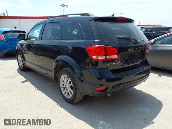 2015 Dodge Journey SXT with VIN 3C4PDCBG2FT718451, listed as a IAAI auction lot 42039821 with 198,695 mi miles and . Bid and sale history available at DreamBid. Image 3.
