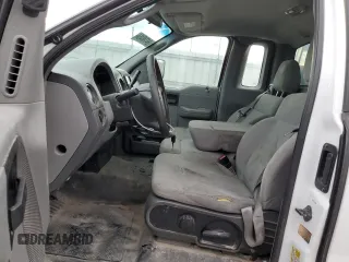 2007 Ford F-150 XL with VIN 1FTRF12W67KD15350, listed as a Copart auction lot 84748464 with 217,276 mi miles and Salvage Title. Bid and sale history available at carsss.com. Image 7.