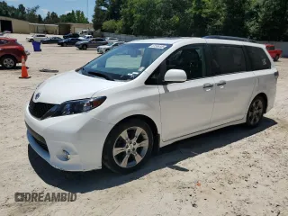 2014 Toyota Sienna SE with VIN 5TDXK3DC4ES501542, listed as a Copart auction lot 61596445 with 204,164 mi miles and Clean title. Bid and sale history available at DreamBid. Image 1.