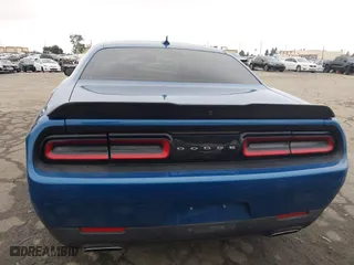 2023 Dodge Challenger SXT with VIN 2C3CDZAG3PH669780, listed as a IAAI auction lot 41525662 with 30,962 mi miles. Bid and sale history available at carsss.com. Image 17.