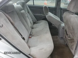 2004 Toyota Camry LE with VIN 4T1BE32K44U857264, listed as a Copart auction lot 51269215 with 169,419 mi miles and Salvage Title. Bid and sale history available at carsss.com. Image 10.