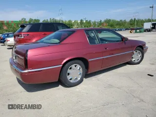 1997 Cadillac Eldorado ESC z VIN 1G6EL12Y5VU614955, wystawiony jako Copart lot #56222345 z przebiegiem 62 030 mil mil oraz Tytuł czysty. Historia ofert i sprzedaży dostępna na DreamBid. Obrazek 3.