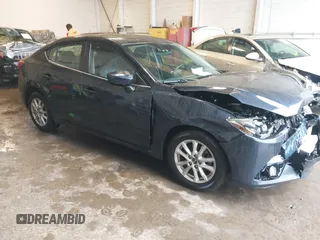 2016 Mazda 3 i Touring with VIN JM1BM1V74G1306843, listed as a IAAI auction lot 42358429 with 168,412 mi miles and . Bid and sale history available at DreamBid. Image 1.