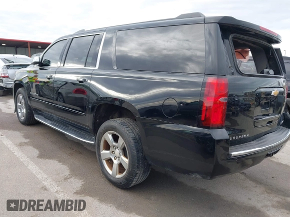 2019 Chevrolet Suburban Premier with VIN 1GNSKJKC7KR261826, listed as a IAAI auction lot 41652451 with 127,032 mi miles and . Bid and sale history available at DreamBid. Image 3.