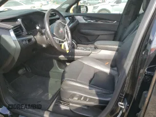2020 Cadillac XT6 FWD Premium Luxury with VIN 1GYKPCRS6LZ102682, listed as a Copart auction lot 56906645 with 76,884 mi miles and Salvage title. Bid and sale history available at DreamBid. Image 7.