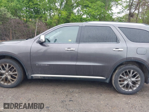 2014 Dodge Durango Citadel with VIN 1C4RDJEG2EC520939, listed as a IAAI auction lot 42272953 with 191,458 mi miles and . Bid and sale history available at DreamBid. Image 14.