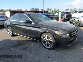 2018 Mercedes-Benz C with VIN WDDWF4JB7JR312934, listed as a IAAI auction lot 41590598 with 94,088 mi miles. Bid and sale history available at carsss.com. Image 1.
