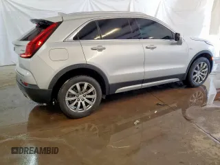 2022 Cadillac XT4 FWD Premium Luxury with VIN 1GYFZCR47NF100232, listed as a Copart auction lot 54520405 with 68,819 mi miles and Clean title. Bid and sale history available at DreamBid. Image 3.
