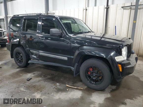 2011 Jeep Liberty Sport with VIN 1J4PN2GK5BW521504, listed as a Copart auction lot 53458415 with 106,120 mi miles and Salvage Title. Bid and sale history available at carsss.com. Image 4.