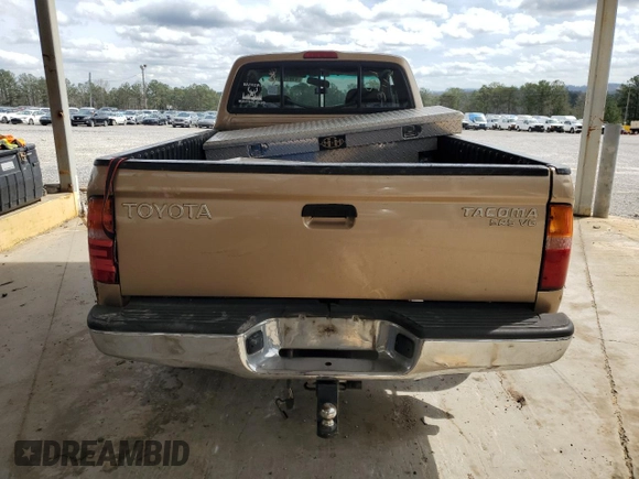 1999 Toyota Tacoma with VIN 4TAWN72NXXZ563507, listed as a Copart auction lot 49888575 with 387,818 mi miles and Salvage title. Bid and sale history available at DreamBid. Image 6.