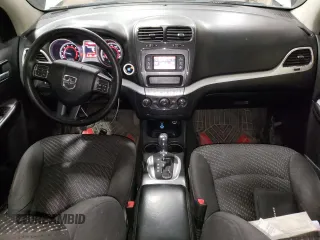 2017 Dodge Journey SXT с VIN 3C4PDDBG7HT592872, выставлен на аукционе Copart как лот 51666905 с пробегом 87 907 миль миль и Списание • Salvage title. История ставок и продаж доступна на DreamBid. Изображение 8.