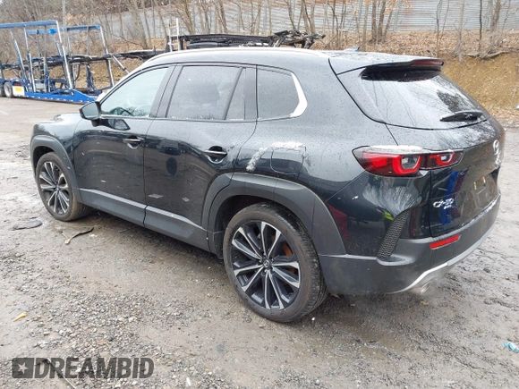 2024 Mazda CX-50 Premium z VIN 7MMVABDYXRN180263, wystawiony jako IAAI lot #41738791 z przebiegiem 9 688 mil mil oraz . Historia ofert i sprzedaży dostępna na DreamBid. Obrazek 3.