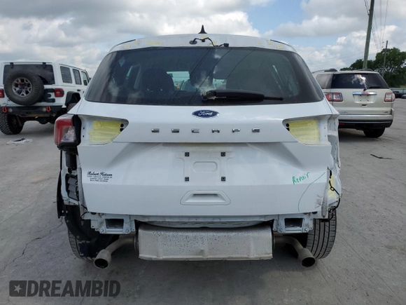 2021 Ford Escape S z VIN 1FMCU0F61MUA01603, wystawiony jako Copart lot #56311505 z przebiegiem 142 398 mil mil oraz Szkoda całkowita • Salvage title. Historia ofert i sprzedaży dostępna na DreamBid. Obrazek 6.