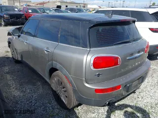 2016 MINI Cooper Clubman with VIN WMWLN5C56G2E30309, listed as a IAAI auction lot 41772501 with 67,584 mi miles. Bid and sale history available at carsss.com. Image 3.