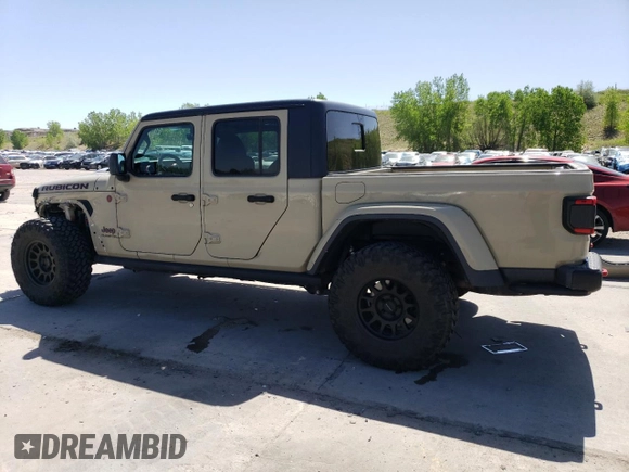 2020 Jeep Gladiator Rubicon z VIN 1C6JJTBG2LL190732, wystawiony jako Copart lot #57100115 z przebiegiem 55 679 mil mil oraz Szkoda całkowita • Salvage title. Historia ofert i sprzedaży dostępna na DreamBid. Obrazek 2.