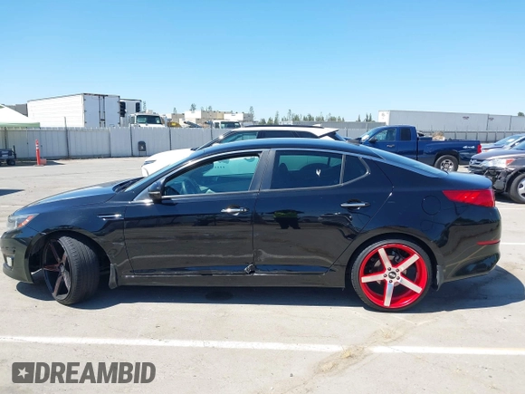 2015 Kia Optima LX z VIN 5XXGM4A76FG507580, wystawiony jako IAAI lot #42544939 z przebiegiem 99 804 mil mil oraz . Historia ofert i sprzedaży dostępna na DreamBid. Obrazek 14.