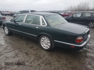 2000 Jaguar XJ with VIN SAJDA25BXYMF01667, listed as a Copart auction lot 41333495 with 102,291 mi miles and Clean Title. Bid and sale history available at DreamBid. Image 2.