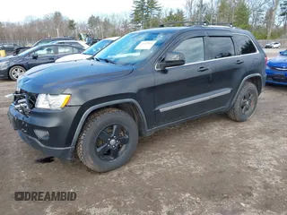 2011 Jeep Grand Cherokee Laredo with VIN 1J4RR4GG5BC670369, listed as a IAAI auction lot 41892892 with 164,807 mi miles and . Bid and sale history available at DreamBid. Image 17.
