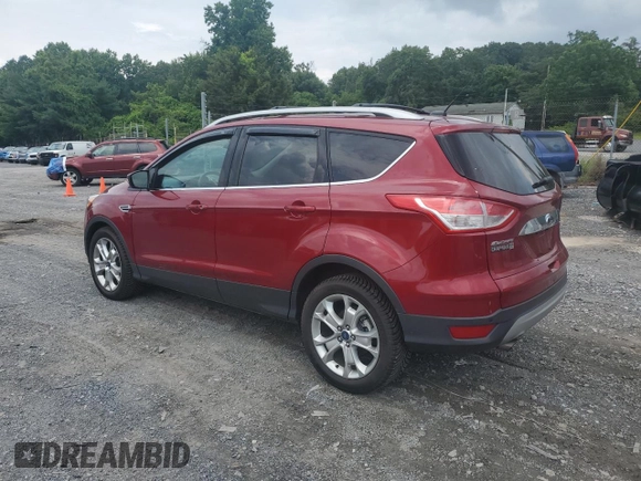 2016 Ford Escape Titanium with VIN 1FMCU9J90GUA02736, listed as a Copart auction lot 63068165 with 23,860 mi miles and Salvage title. Bid and sale history available at DreamBid. Image 2.