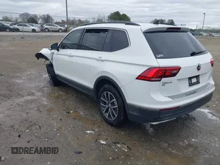 2020 Volkswagen Tiguan SE with VIN 3VV3B7AX2LM055418, listed as a IAAI auction lot 41248422 with Not Provided miles and . Bid and sale history available at DreamBid. Image 3.