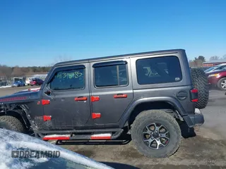 2020 Jeep Wrangler Unlimited Rubicon with VIN 1C4HJXFG3LW291155, listed as a IAAI auction lot 41348485 with 72,481 mi miles and . Bid and sale history available at DreamBid. Image 14.