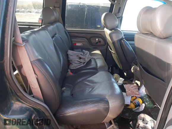 2000 GMC Denali with VIN 1GKEK13R6YR146253, listed as a Copart auction lot 44381765 with 264,950 mi miles and Salvage Title. Bid and sale history available at DreamBid. Image 11.