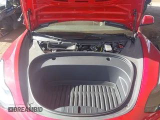 2023 Tesla Model 3 with VIN 5YJ3E1EA9PF546264, listed as a IAAI auction lot 41657055 with 5,634 mi miles and . Bid and sale history available at DreamBid. Image 10.