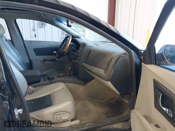2003 Cadillac CTS with VIN 1G6DM57N630145426, listed as a IAAI auction lot 42141105 with 203,859 mi miles. Bid and sale history available at carsss.com. Image 5.