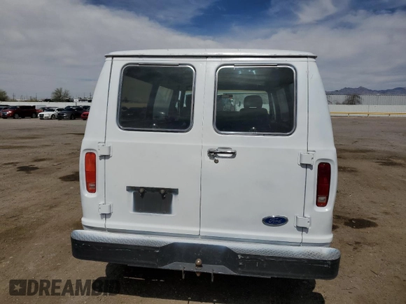 1989 Ford Econoline Cargo with VIN 1FTEE14Y2KHC41026, listed as a Copart auction lot 49440055 with 54,481 mi miles and Salvage Title. Bid and sale history available at DreamBid. Image 6.
