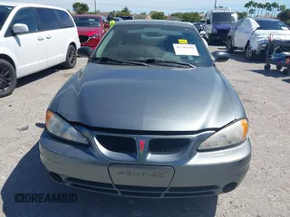 2005 Pontiac Grand Am SE with VIN 1G2NE52E25M101462, listed as a IAAI auction lot 41743136 with 77,376 mi miles. Bid and sale history available at carsss.com. Image 13.