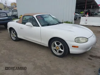 1999 Mazda MX-5 Miata with VIN JM1NB3539X0111435, listed as a IAAI auction lot 41901654 with 150,020 mi miles and . Bid and sale history available at DreamBid. Image 1.